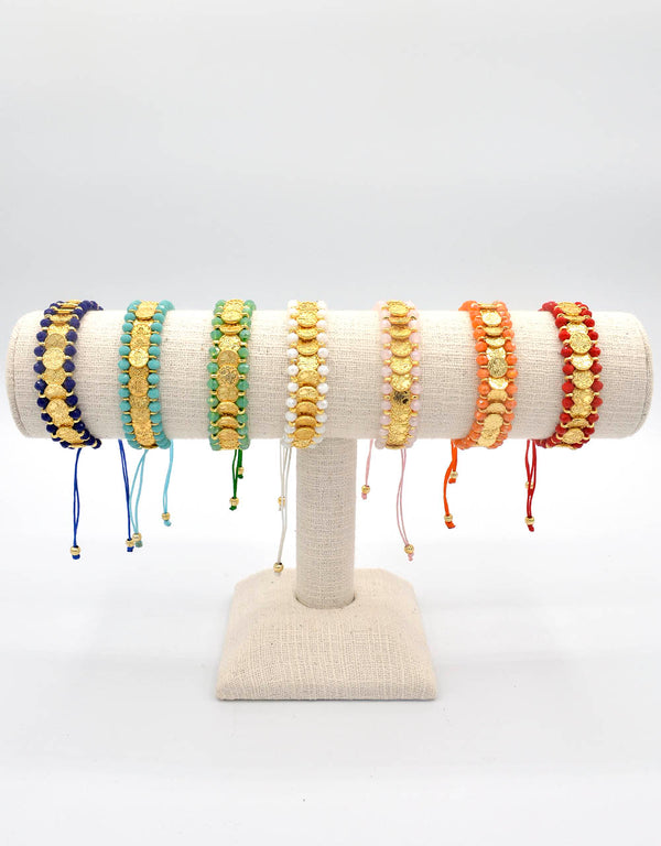 Golden bracelet with quartz and coins